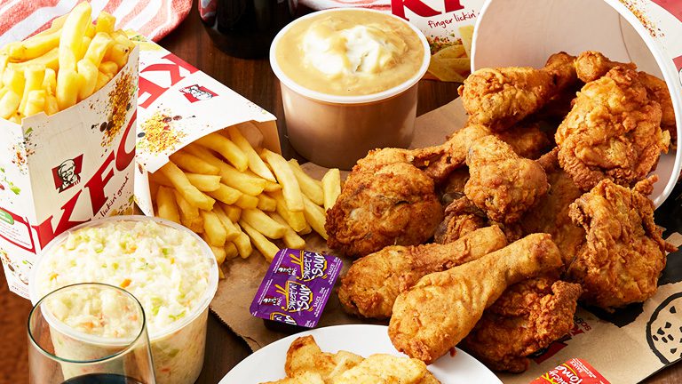 KFC photo featuring Chicken, fries, mashed potatoes and coleslaw