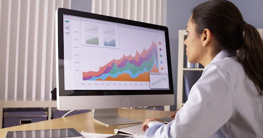 female outsource bookkeeper working with charts